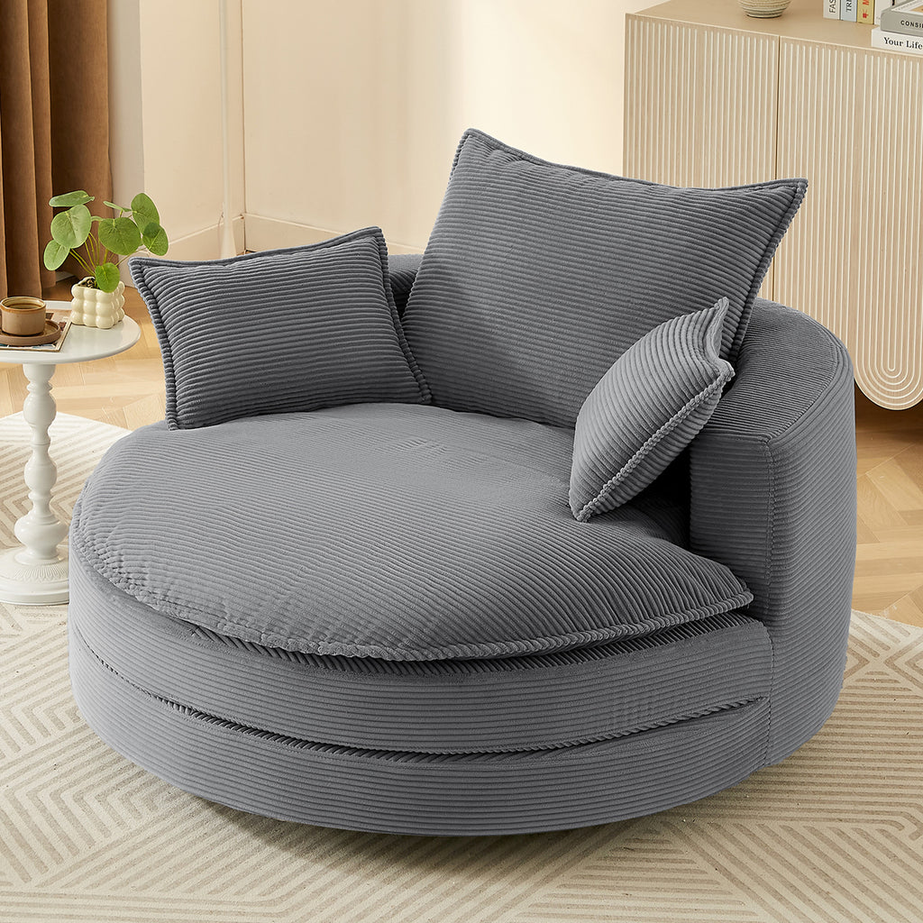 Oversized grey barrel chair 360 degree swivel base — angle view