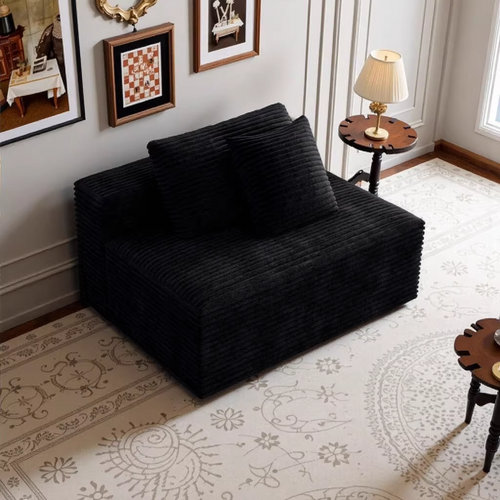 Black corduroy modular sectional sofa in living room setting