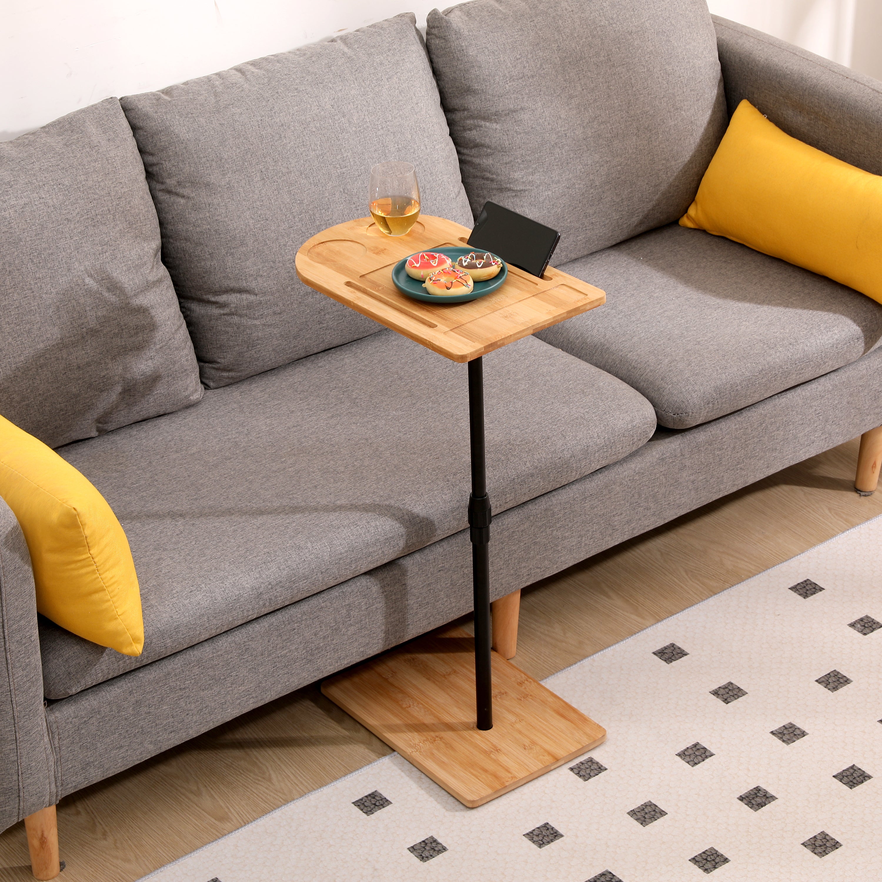Natural bamboo adjustable side table height mechanism close-up