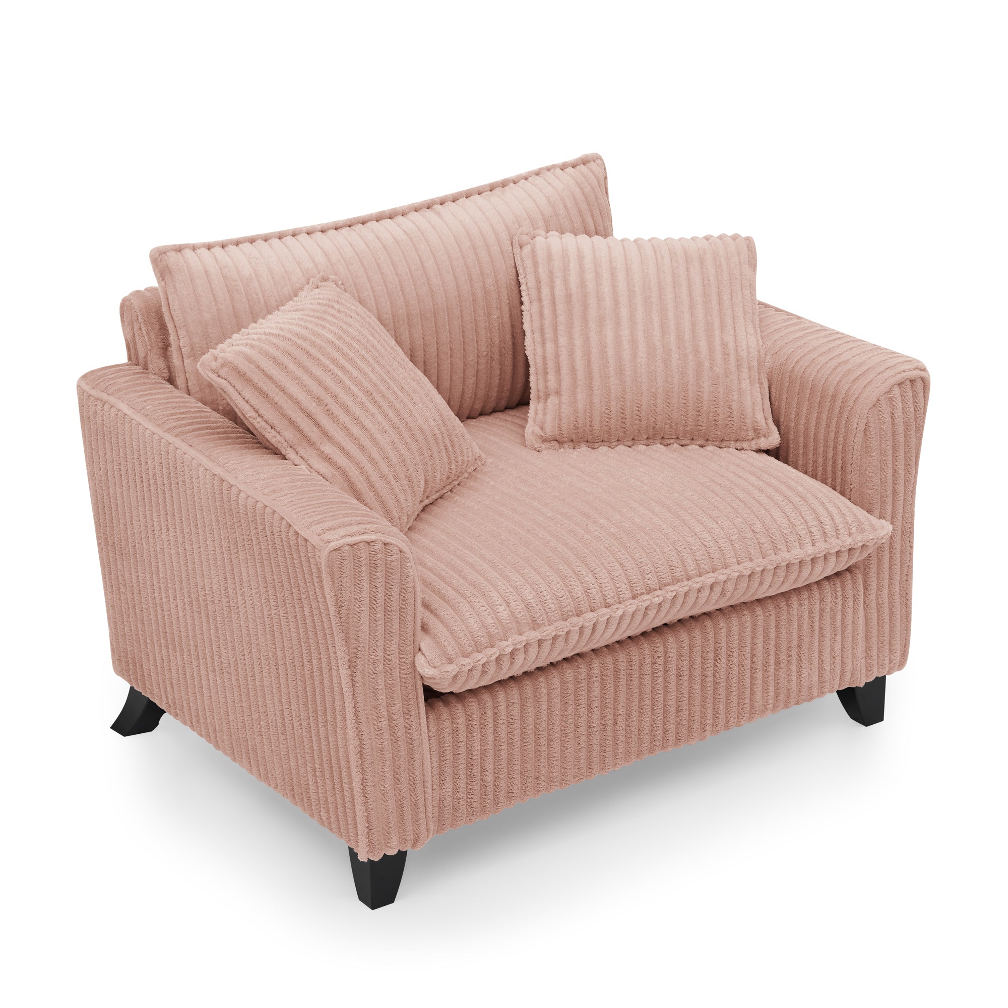 Pink corduroy sofa chair in bedroom corner