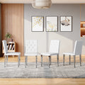 4-pack white PU dining chairs: ergonomic buckle backrest, 35 inches high, silver metal legs,Combines Comfort and Texture.Perfectly suitable for family dining rooms,hotel banquet halls,etc.W1151P295715