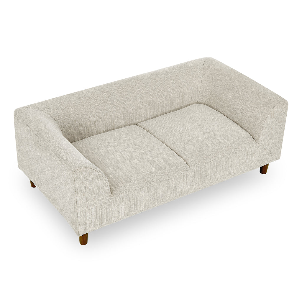 Beige pet sofa with backrest and armrests — front view