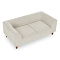 Beige pet sofa with backrest and armrests — front view