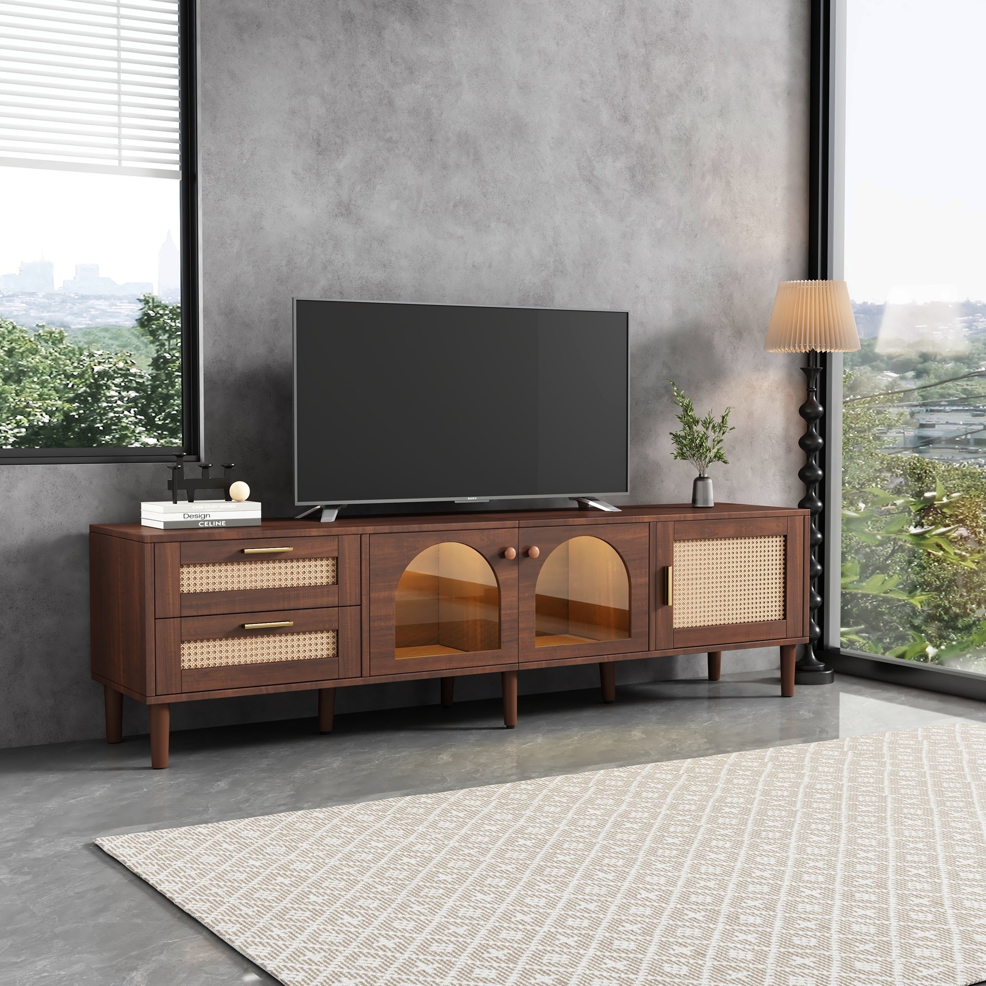 Woven rattan drawer detail on dark brown TV stand