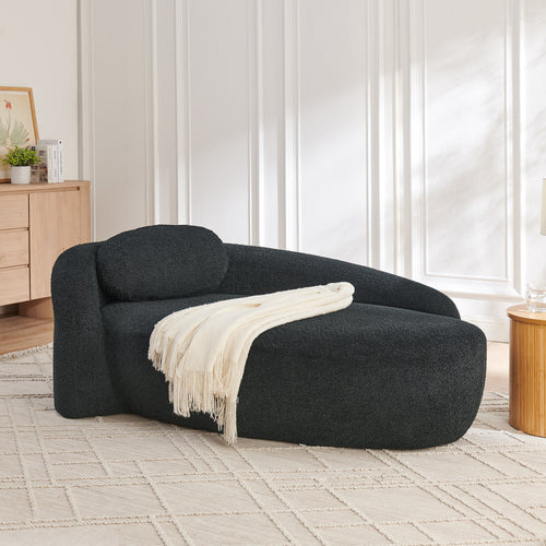 Black bouclé oval lazy lounge chair with pillow — front view