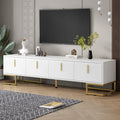 White modern TV stand with gold handles — front view