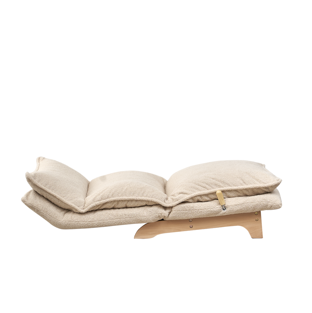 Beige lounge sofa bed chair — reclined position