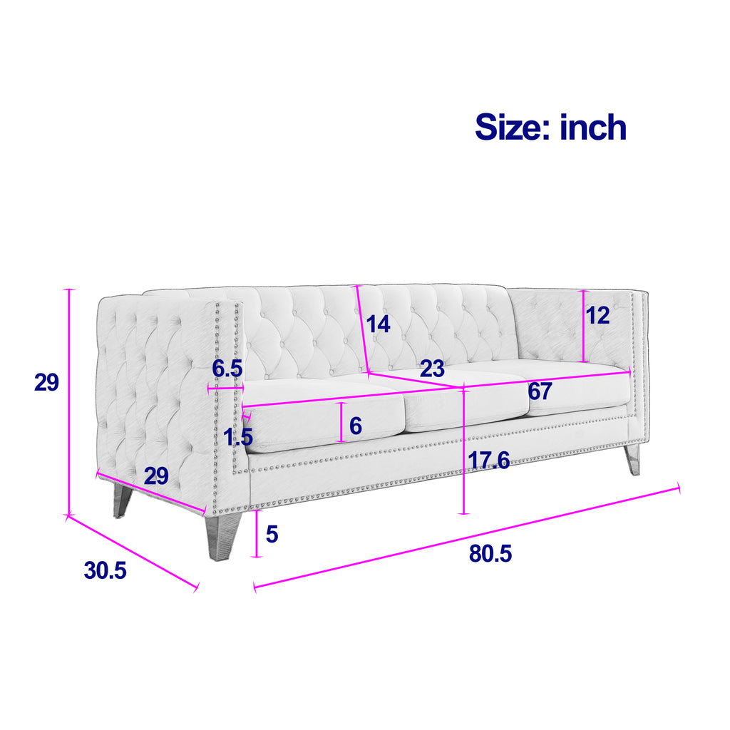Grey Chesterfield sofa with button tufting in living room setting