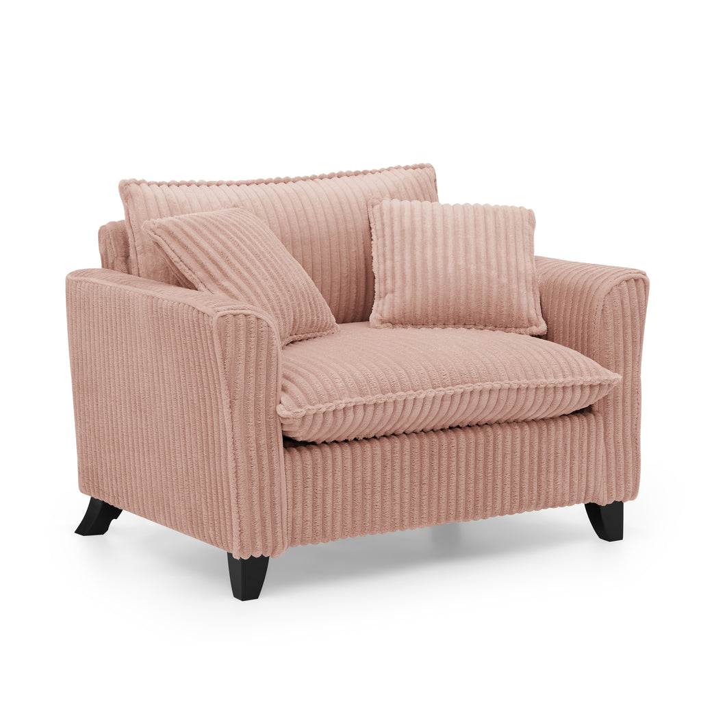 Pink accent chair in reading nook setting