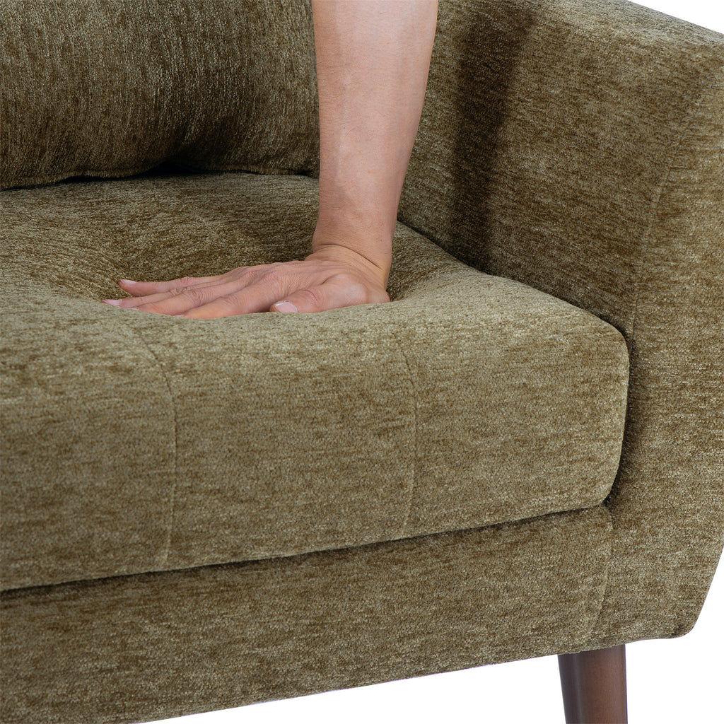 Olive green accent chair back and arms detail