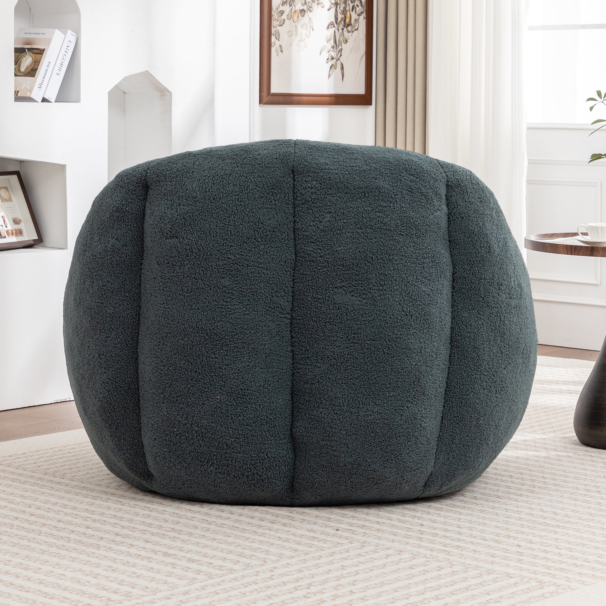 Green bean bag chair in dorm or bedroom setting