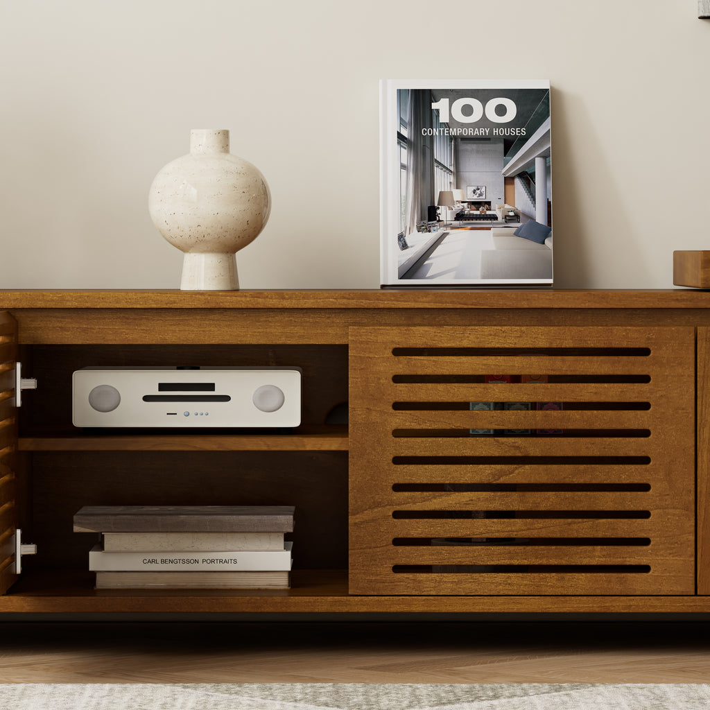 Brown ebony TV cabinet with organized storage layout