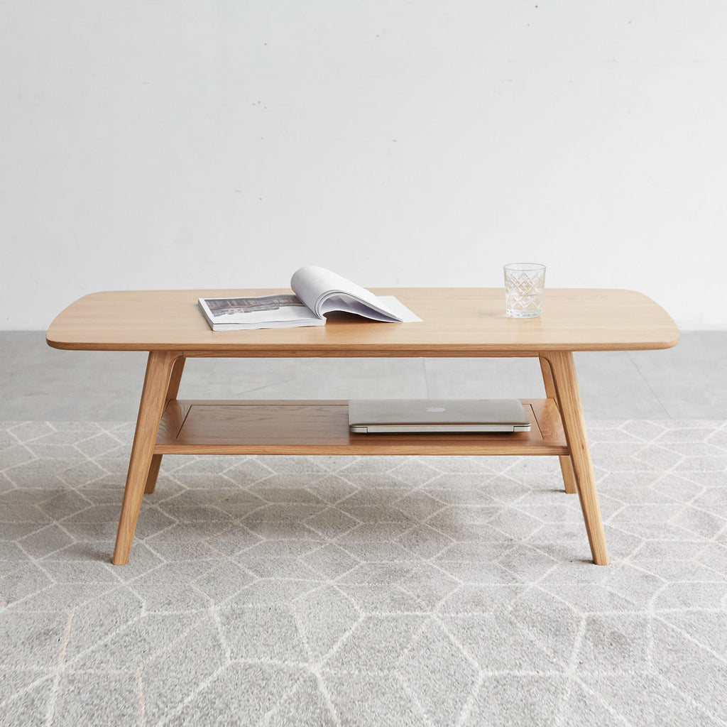 Dual-layer open storage shelf on natural oak center table