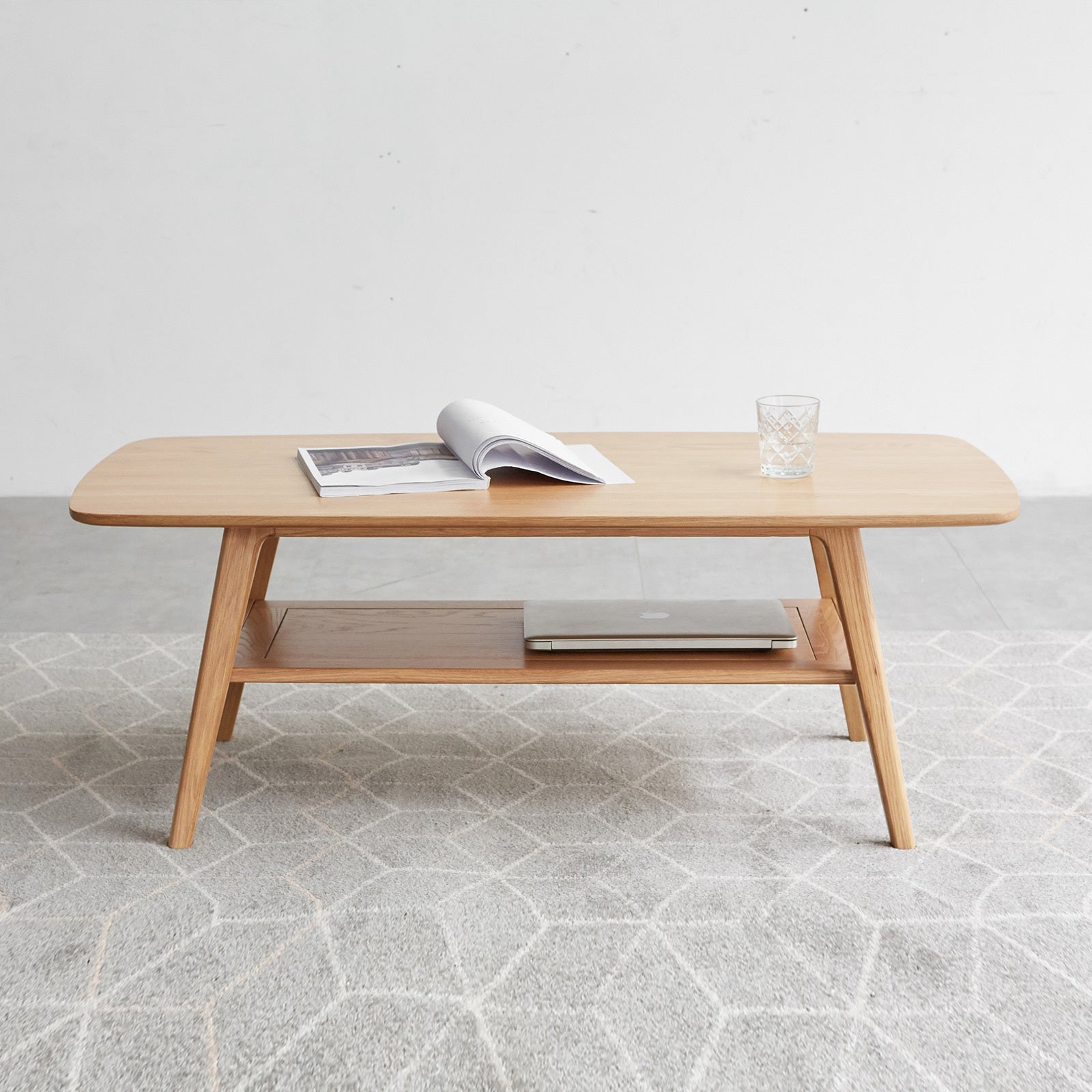 Dual-layer open storage shelf on natural oak center table