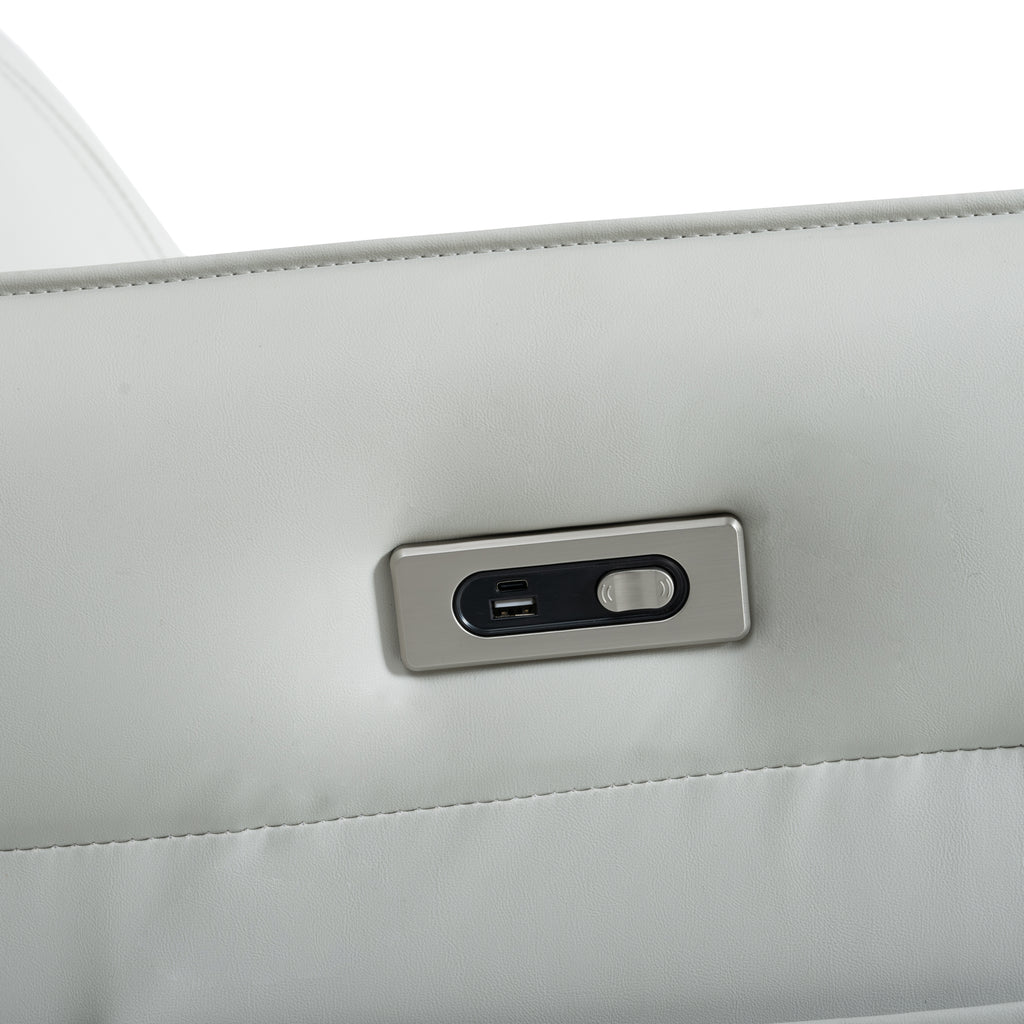 Light gray power swivel rocker recliner — product photo