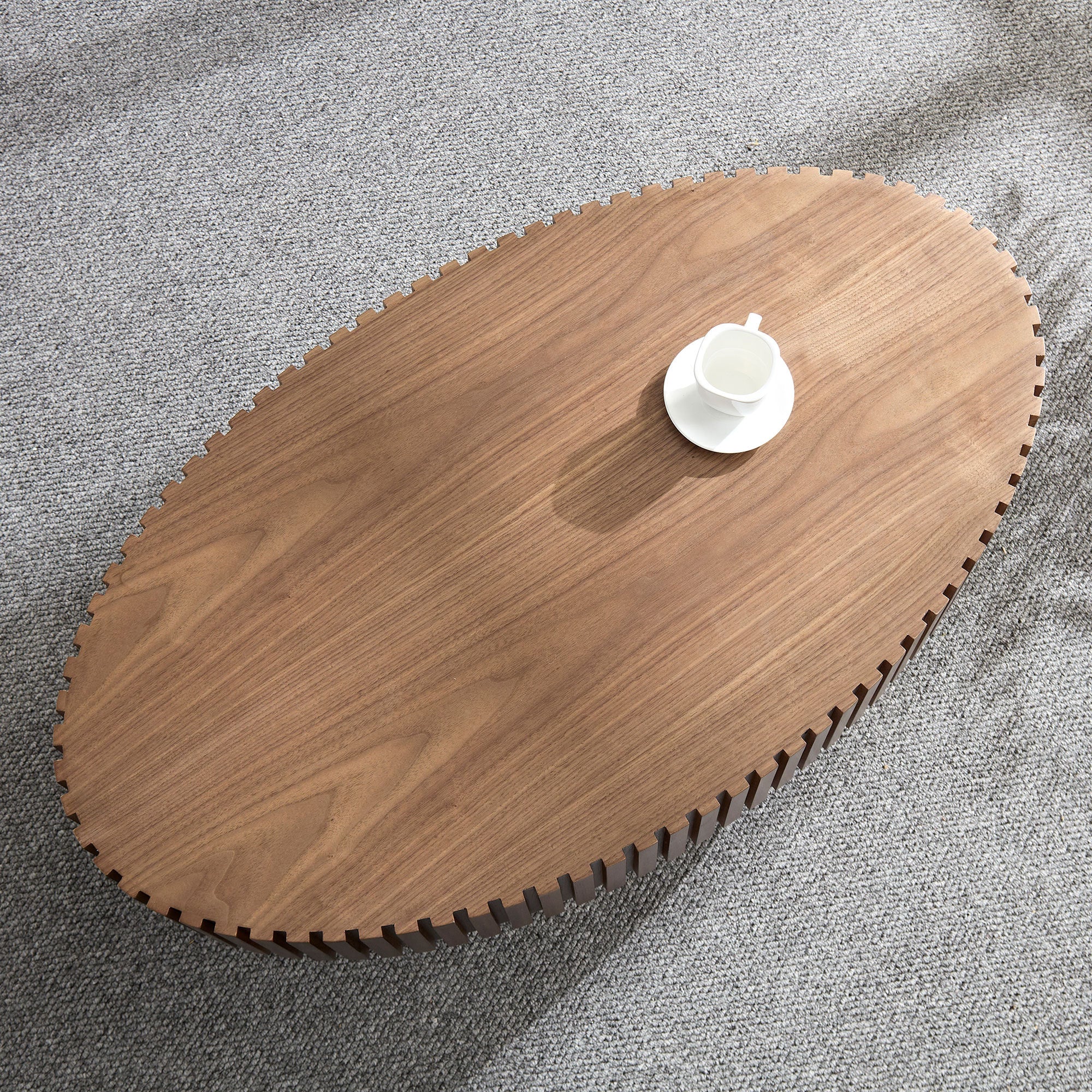Modern handcraft oval coffee table in living room setting