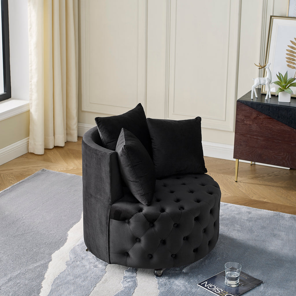 Black velvet swivel accent chair caster wheels detail