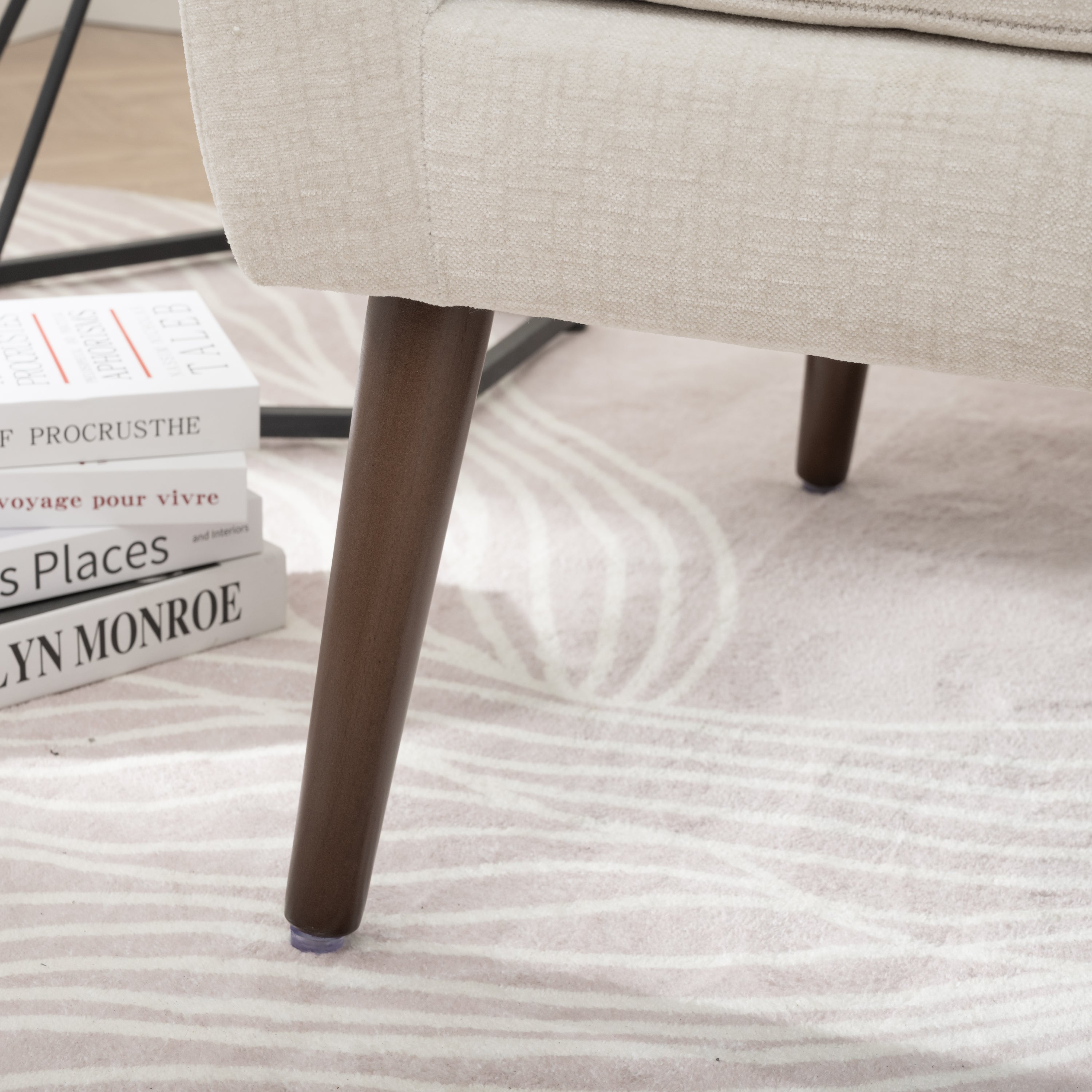 Tapered rubberwood leg detail on accent chair