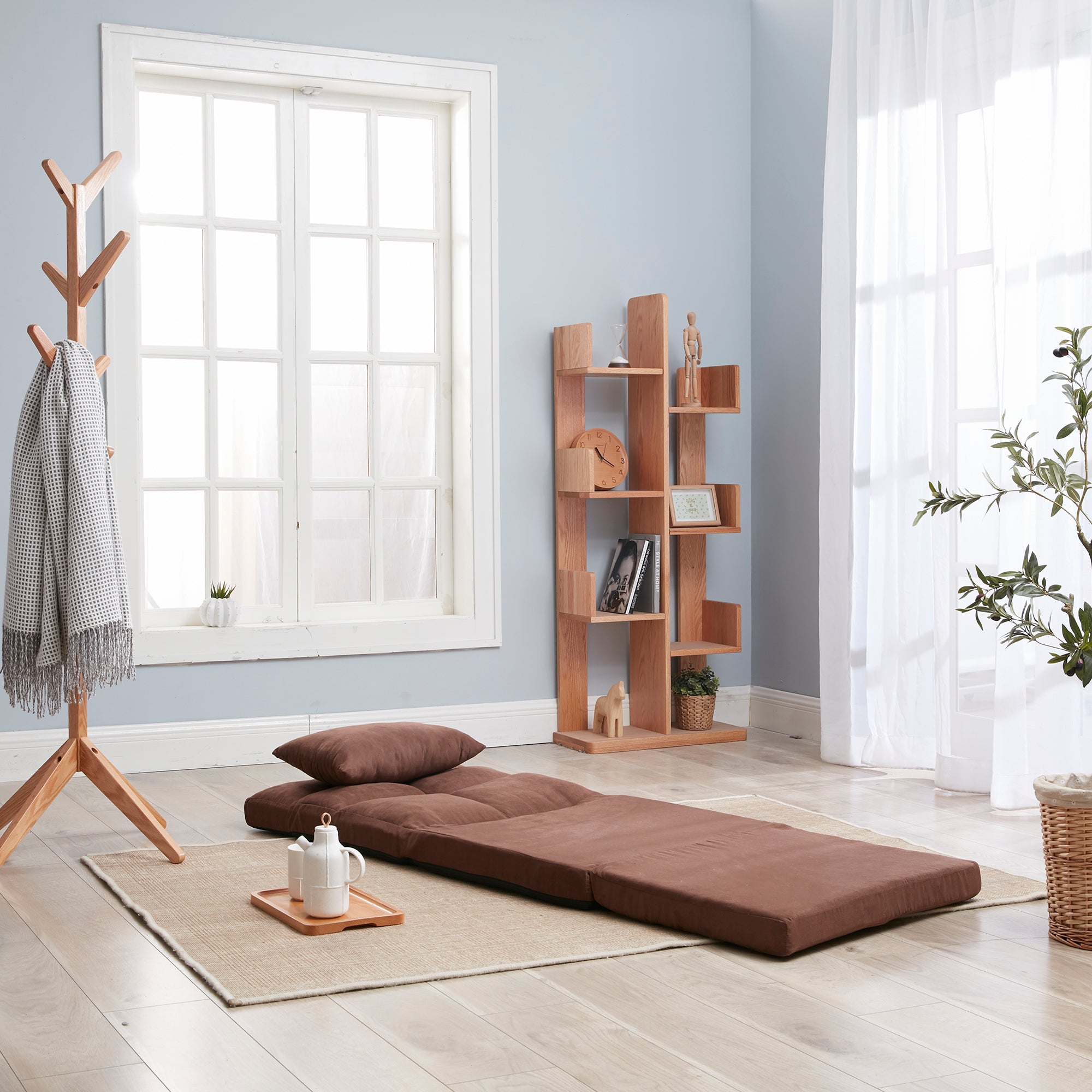 Brown metal frame fold-down floor sofa bed with pillow product photo