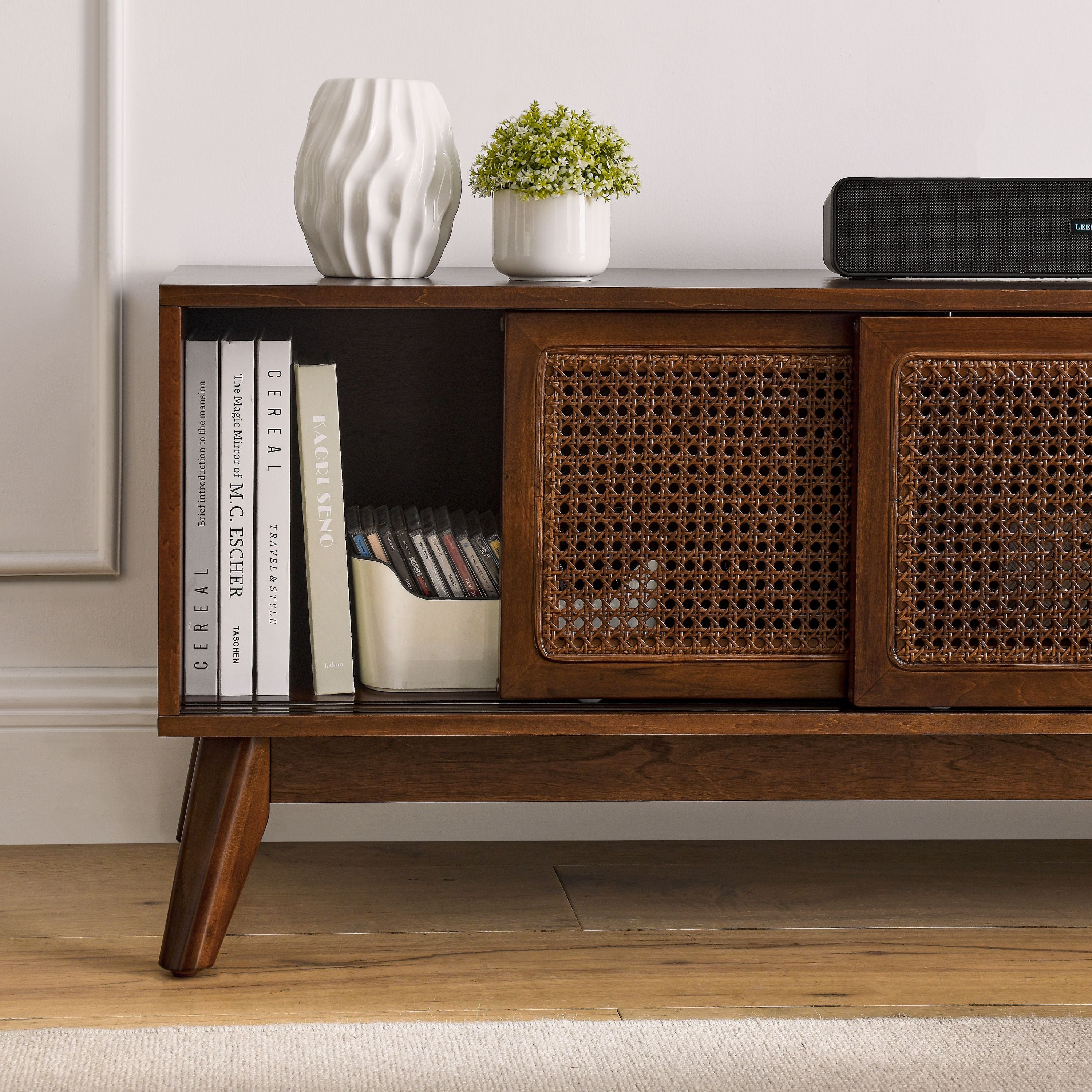 Walnut entertainment center with solid wood legs angle view