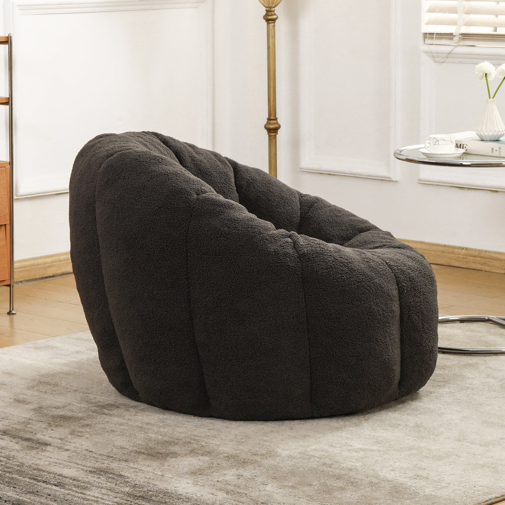 Dark gray teddy faux fur bean bag in living room setting
