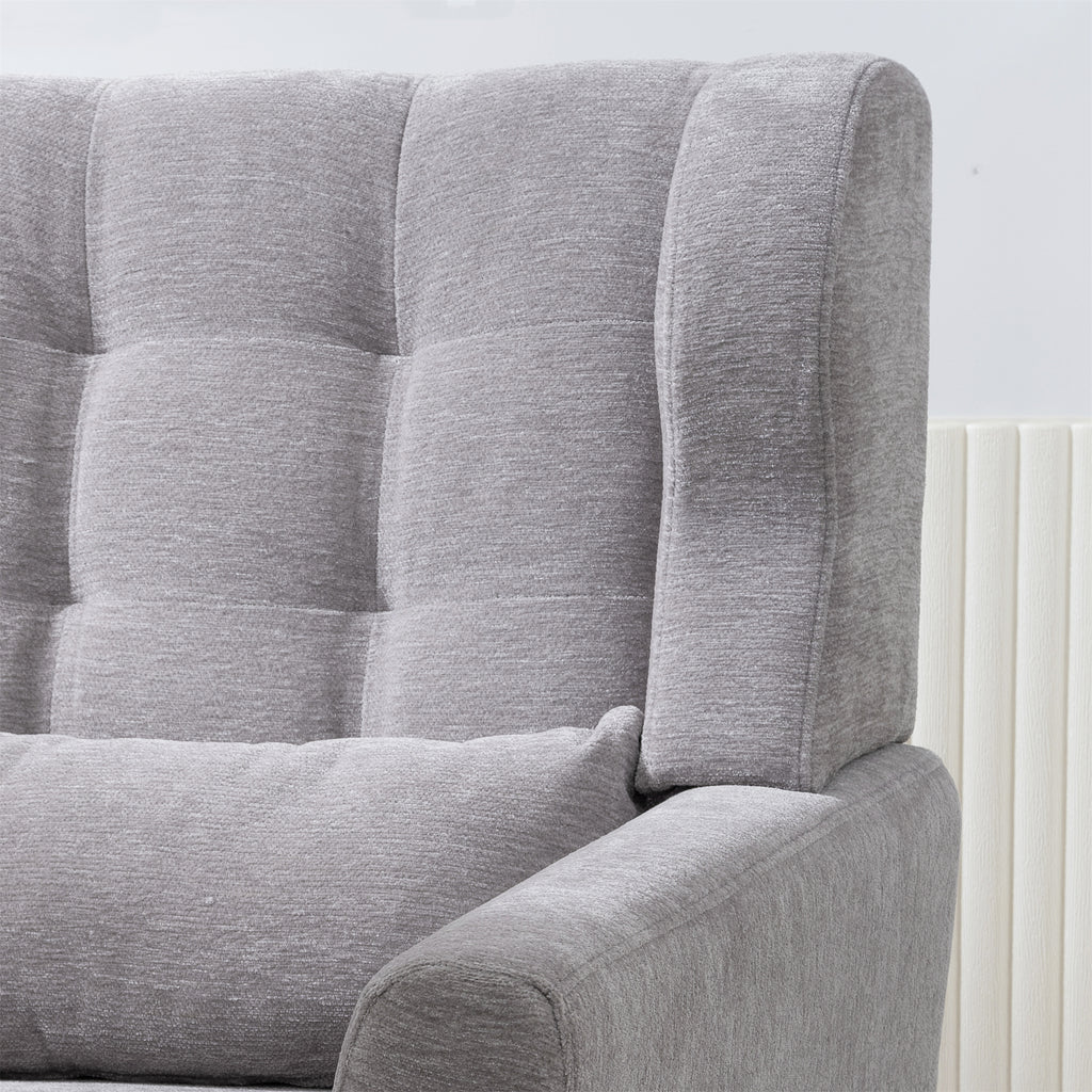 Gray mid-century armchair in bedroom setting