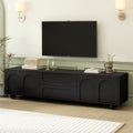 Black arched TV stand with iron legs — front view