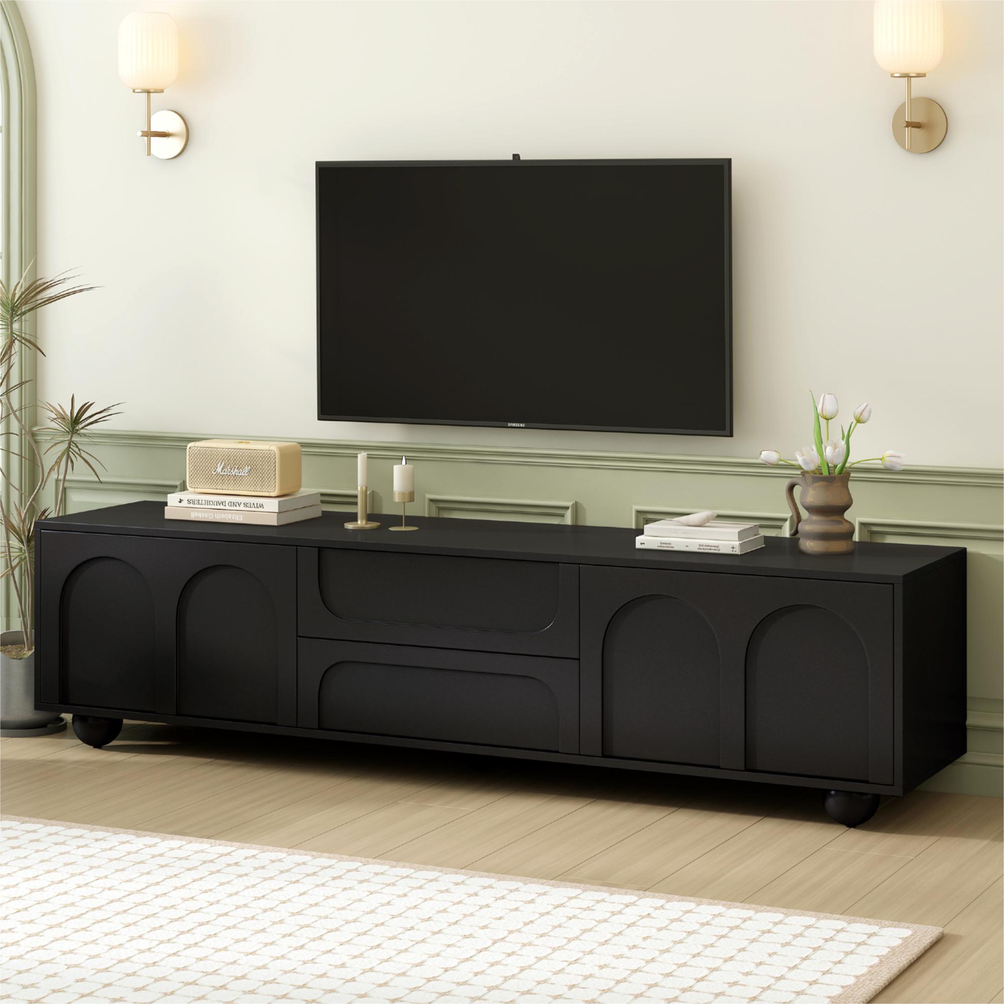 Black arched TV stand with iron legs — front view