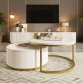 White and gold round nesting coffee table set — front view