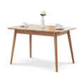 Light oak extendable solid oak dining table — front view
