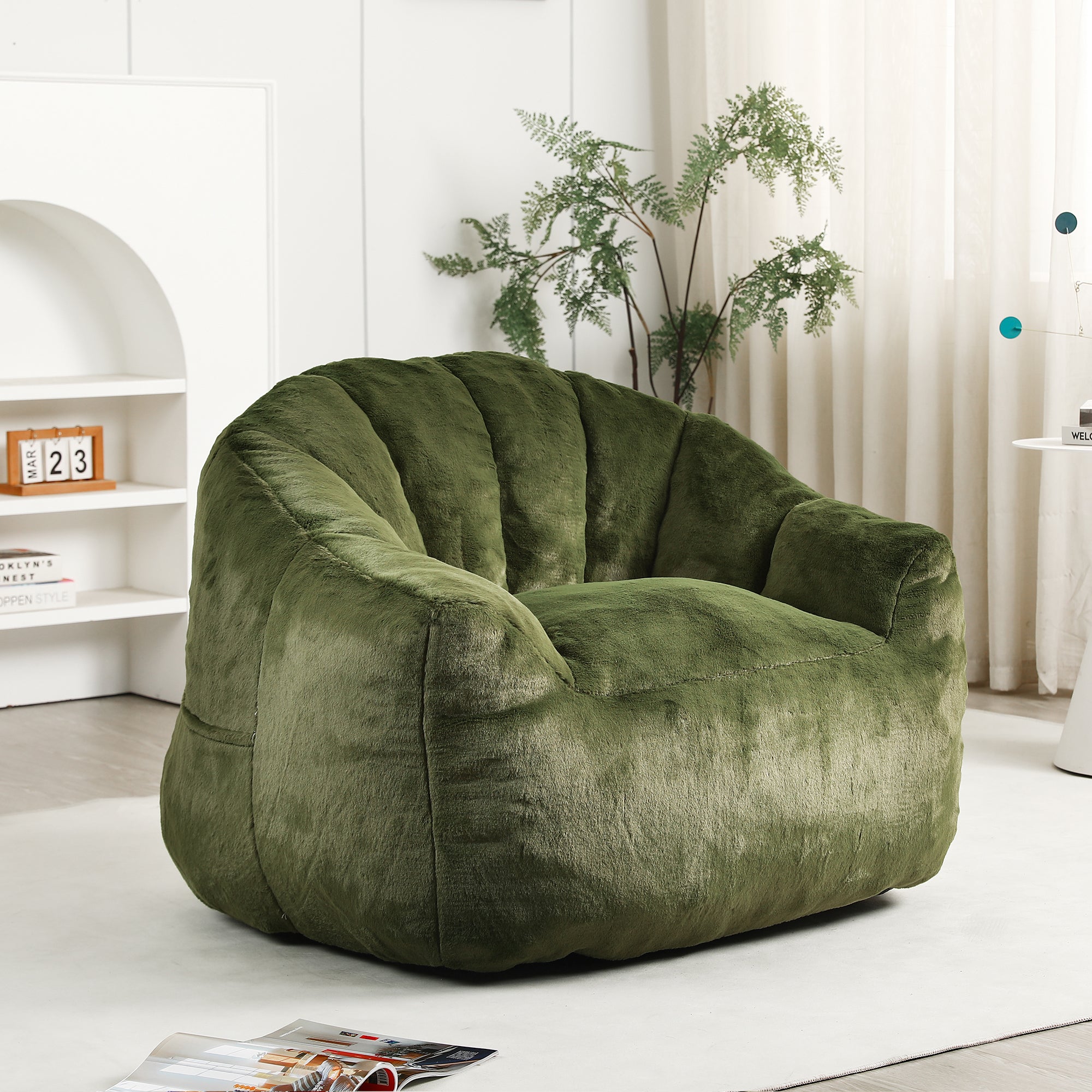 Green bean bag sofa chair — angle view