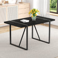 A 55-Inch minimalist retro rectangular dining table with a black textured top with Inset Rectangular Black Metal legs.Minimalist MDF Tabletop.Meeting various purposes such as dining and working.