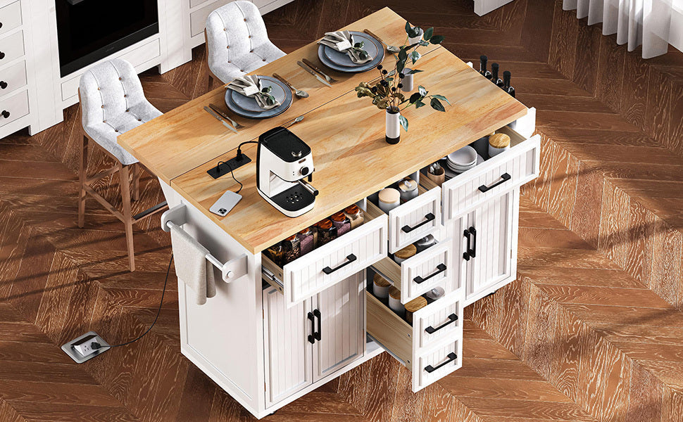 K&K 56.5'' Kitchen Island with Drop Leaf, Power Outlet, Embossed Vertical Stripe Rolling Kitchen Cart on Wheels with 4 Doors , 5 Deep Drawers and Adjustable Shelves, for Kitchen, Dining Room, Black