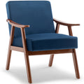 Blue velvet mid-century wingback accent chair — front view