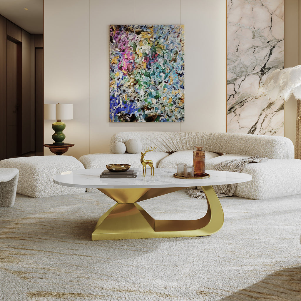 Large modern oval coffee table gold veined marble top — angle view