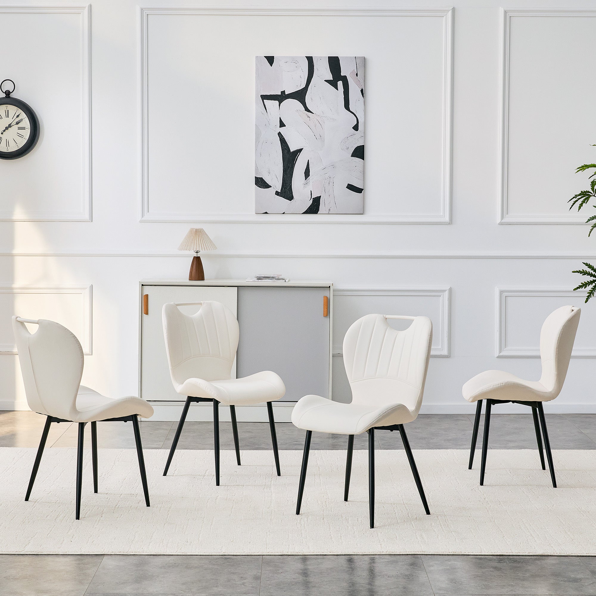 Set of 4 White PU Dining Chairs with Integrated Handle. Black Metal Frame, Adjustable Leveling Feet. Home Dining Chairs with Extra-Wide Comfortable Cushion, Versatile for Multiple Scenarios.