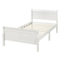 White twin sleigh platform bed with headboard and footboard — front view
