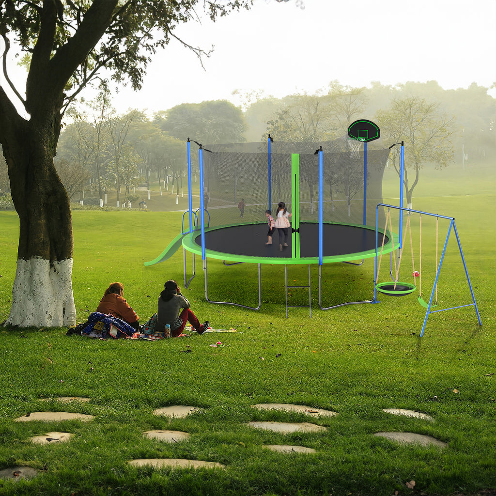 Outdoor trampoline with swing attachment and plastic slide angle view