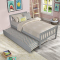 Gray twin bed with trundle platform frame — front view