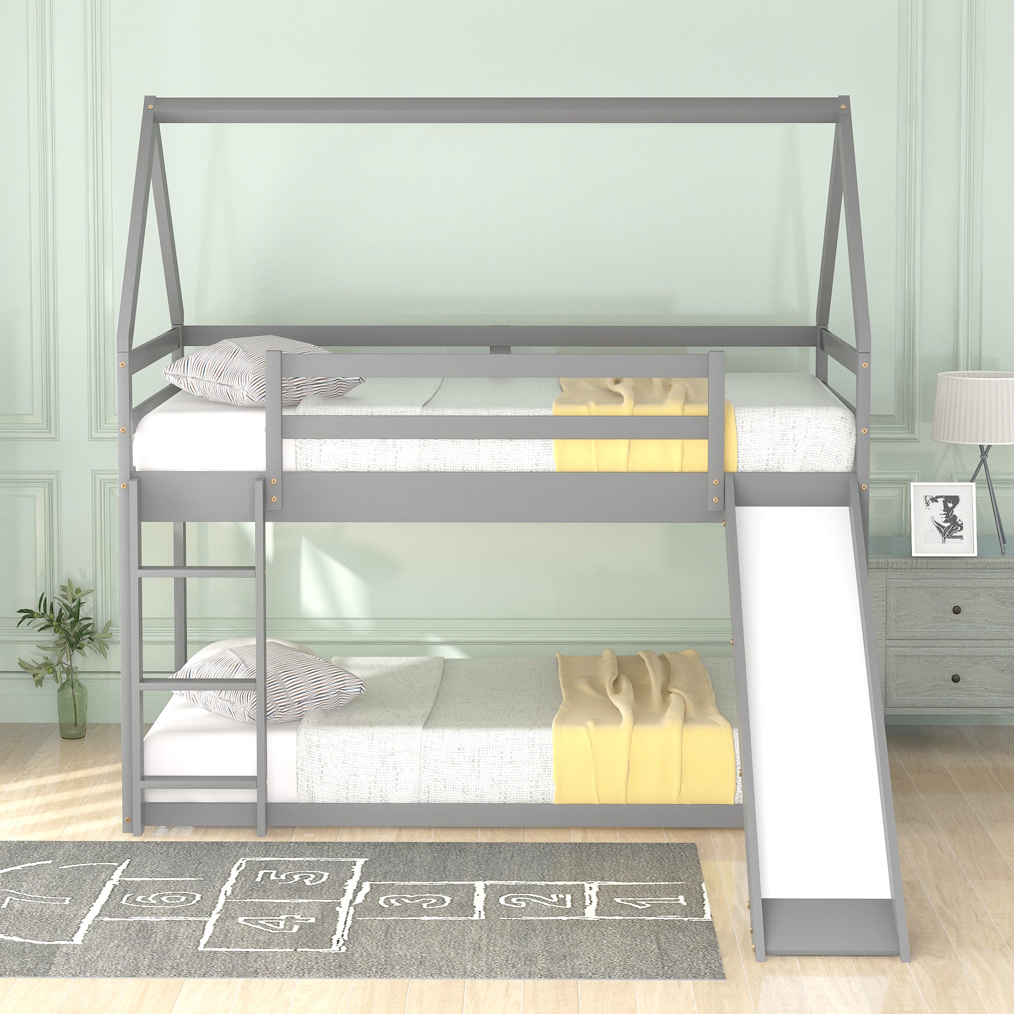 Gray house bunk bed with full-length upper guardrails