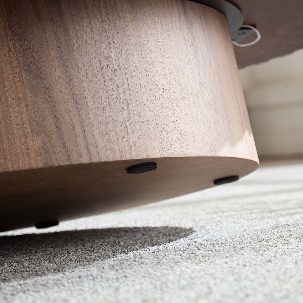 Modern pedestal coffee table top surface close-up