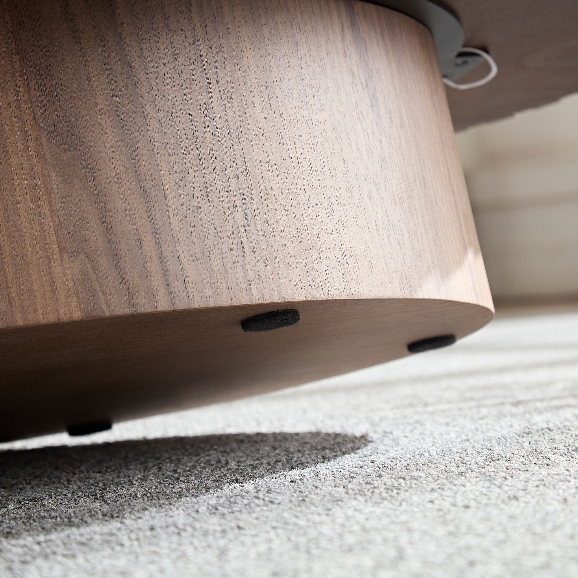 Modern pedestal coffee table top surface close-up
