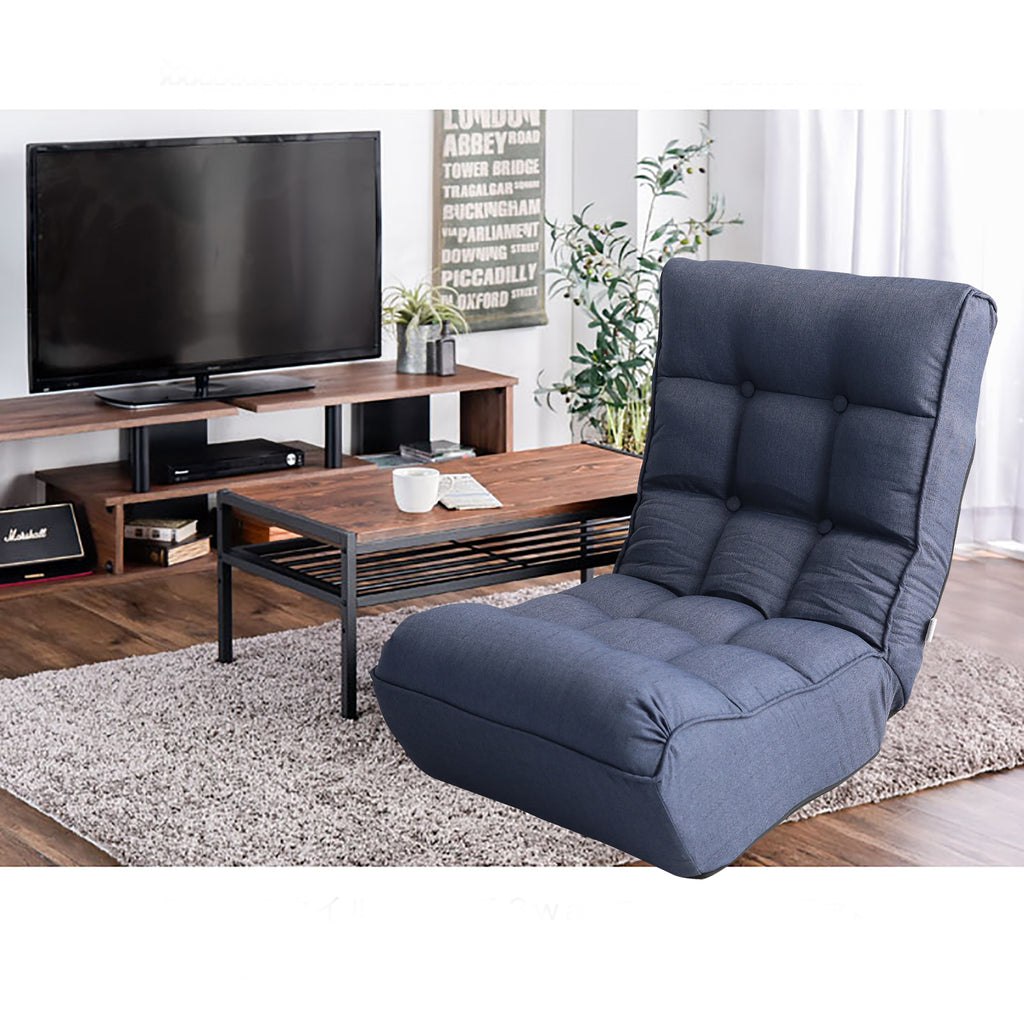 Spring seat support detail on navy floor chair