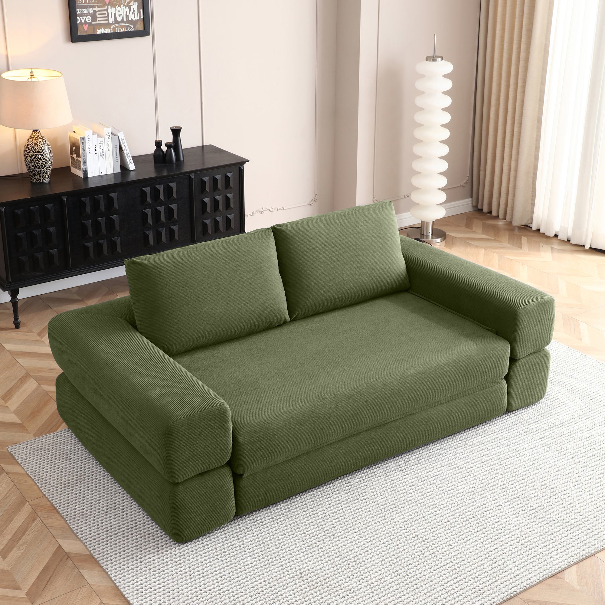 Green corduroy foldable sofa bed — front view