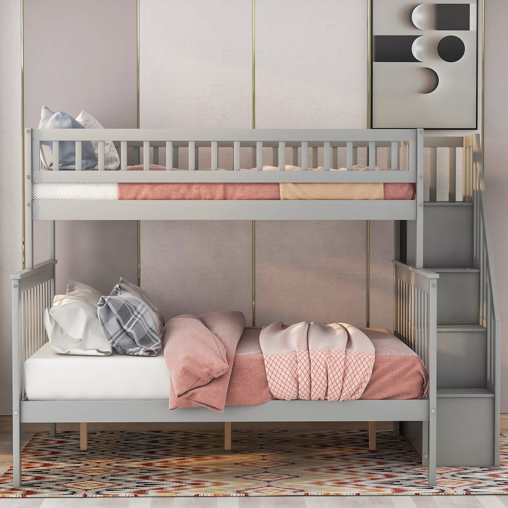 Twin over full bunk bed with safety guardrails on upper bunk