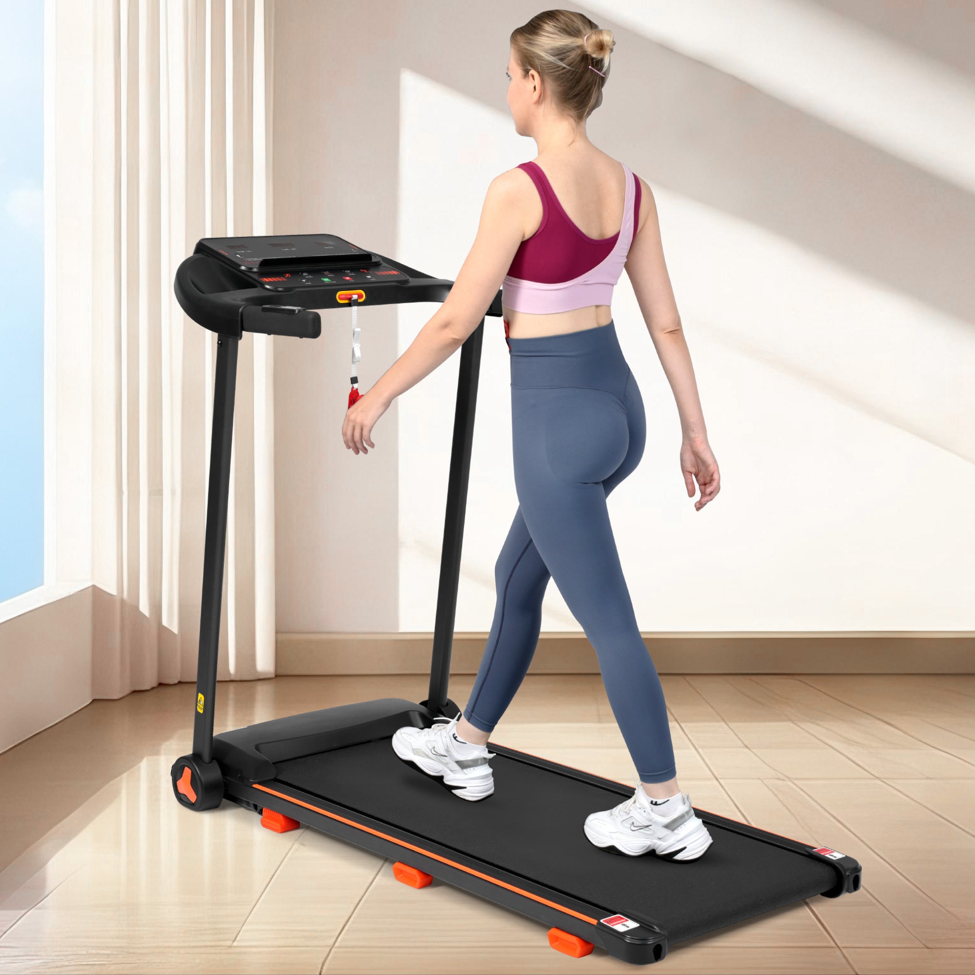 Treadmill folded upright for compact storage