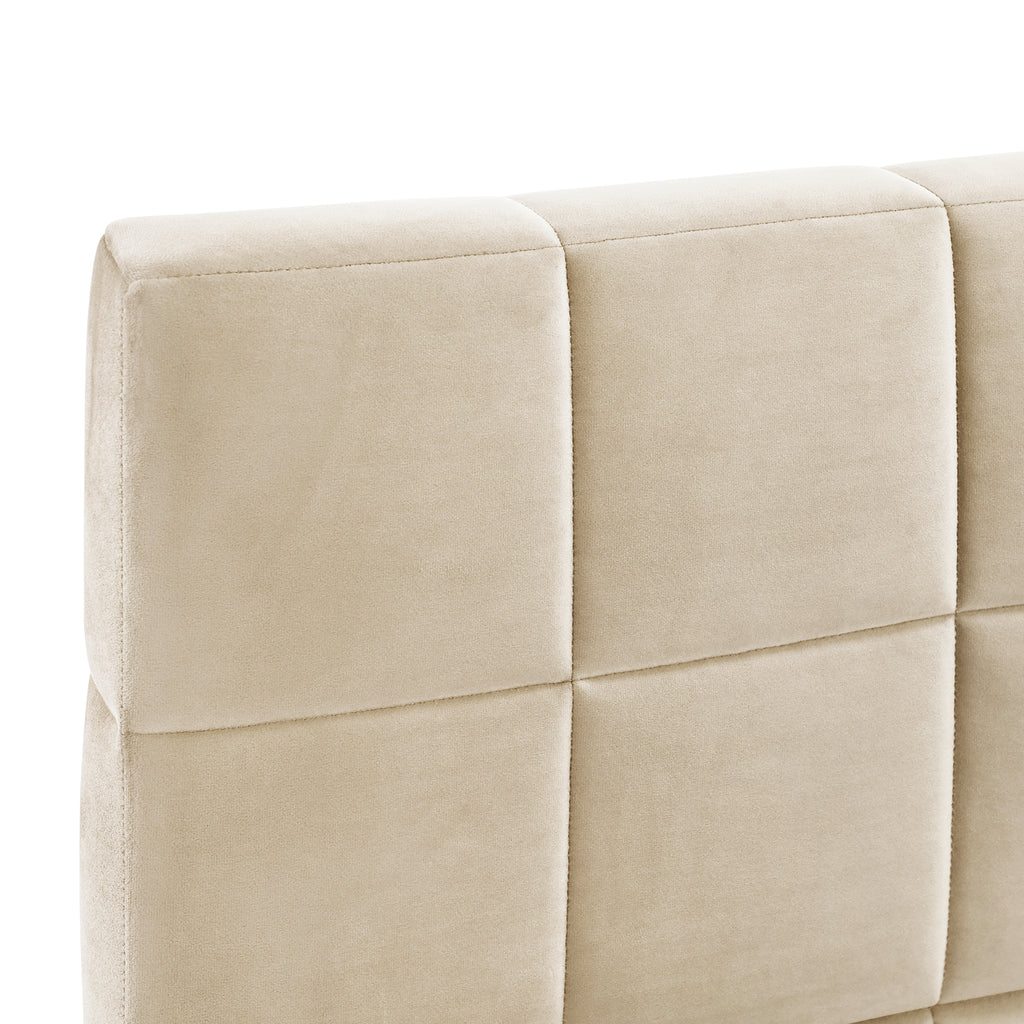 Beige daybed styled as sofa in living space