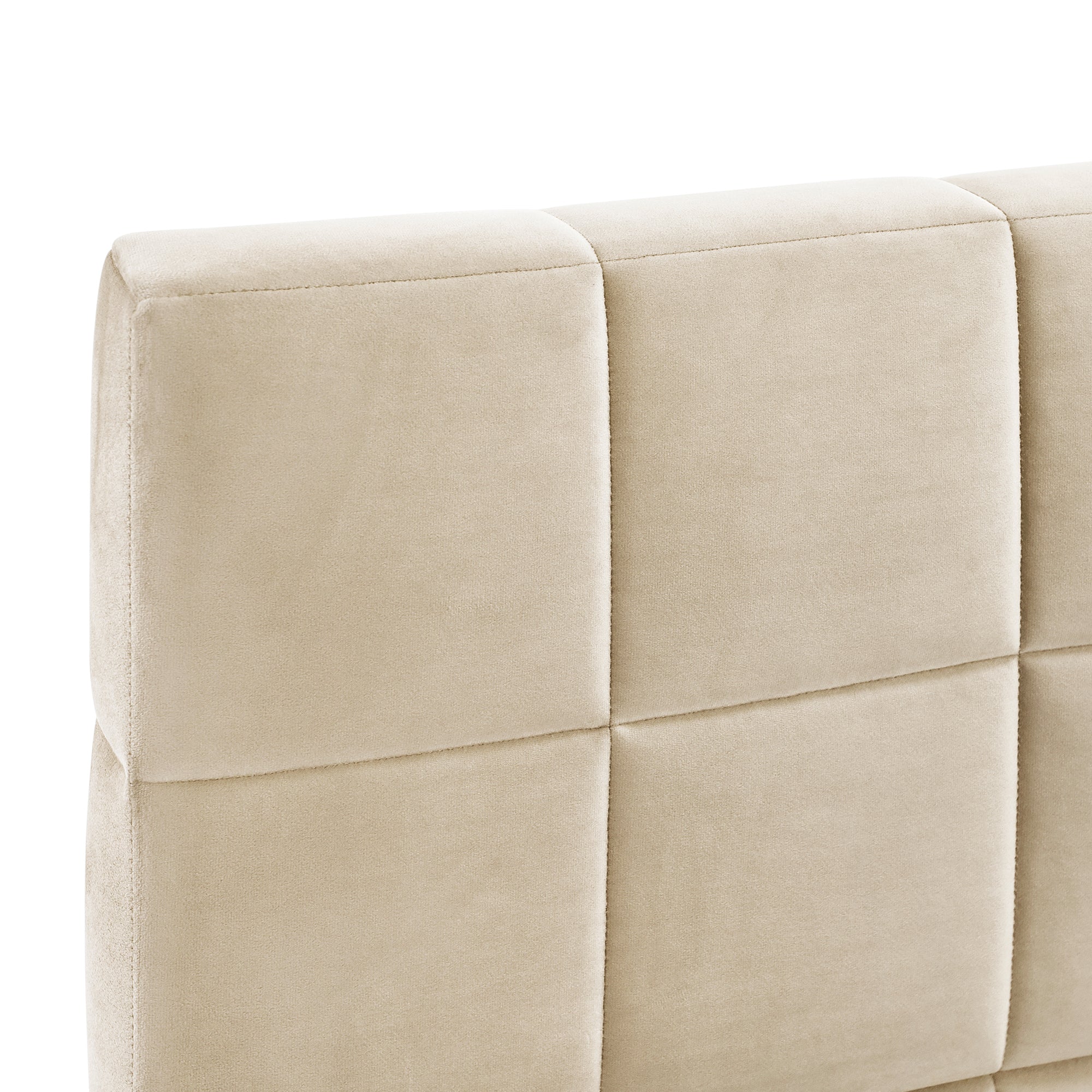 Beige daybed styled as sofa in living space