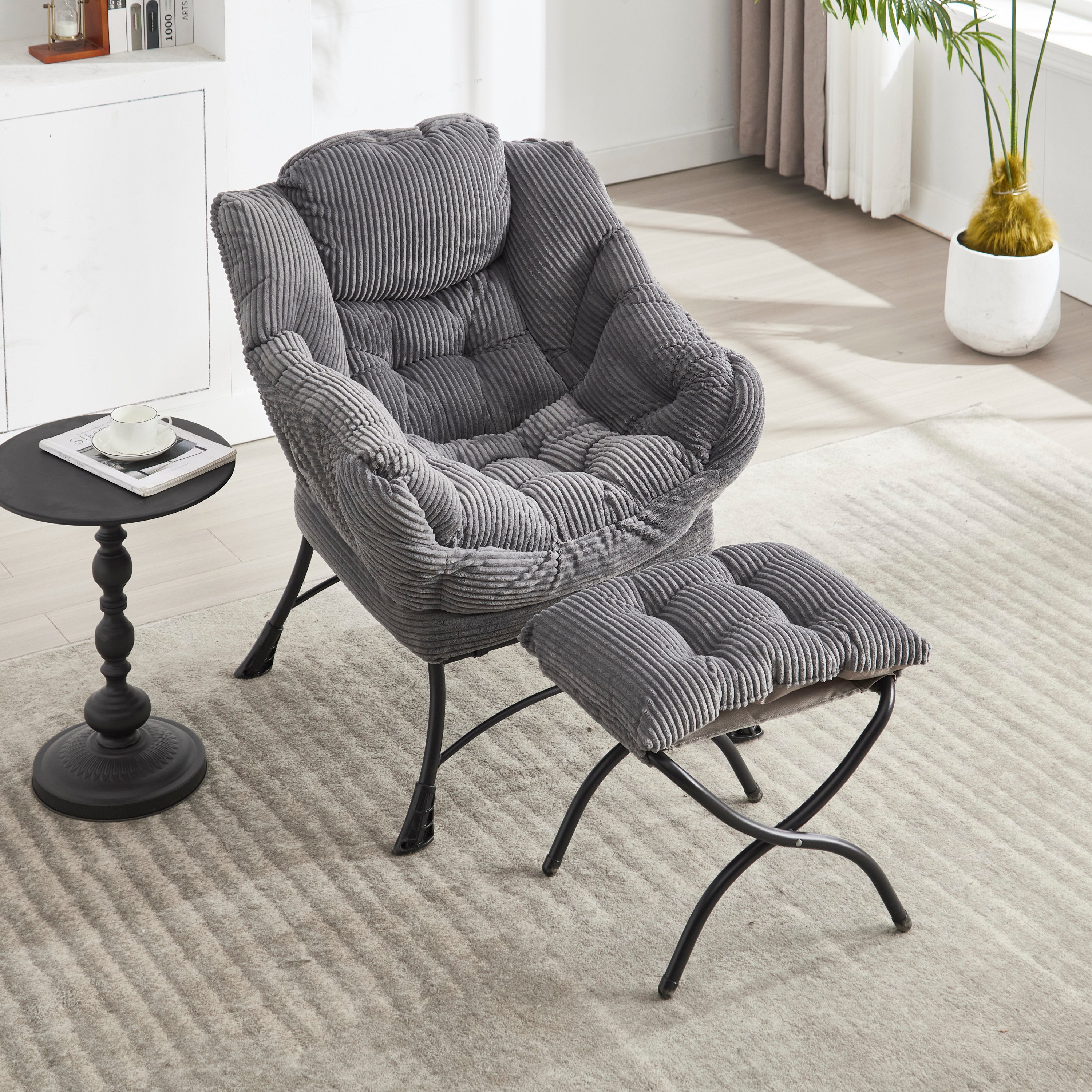 Gray lazy lounge chair with foldable ottoman in living room setting