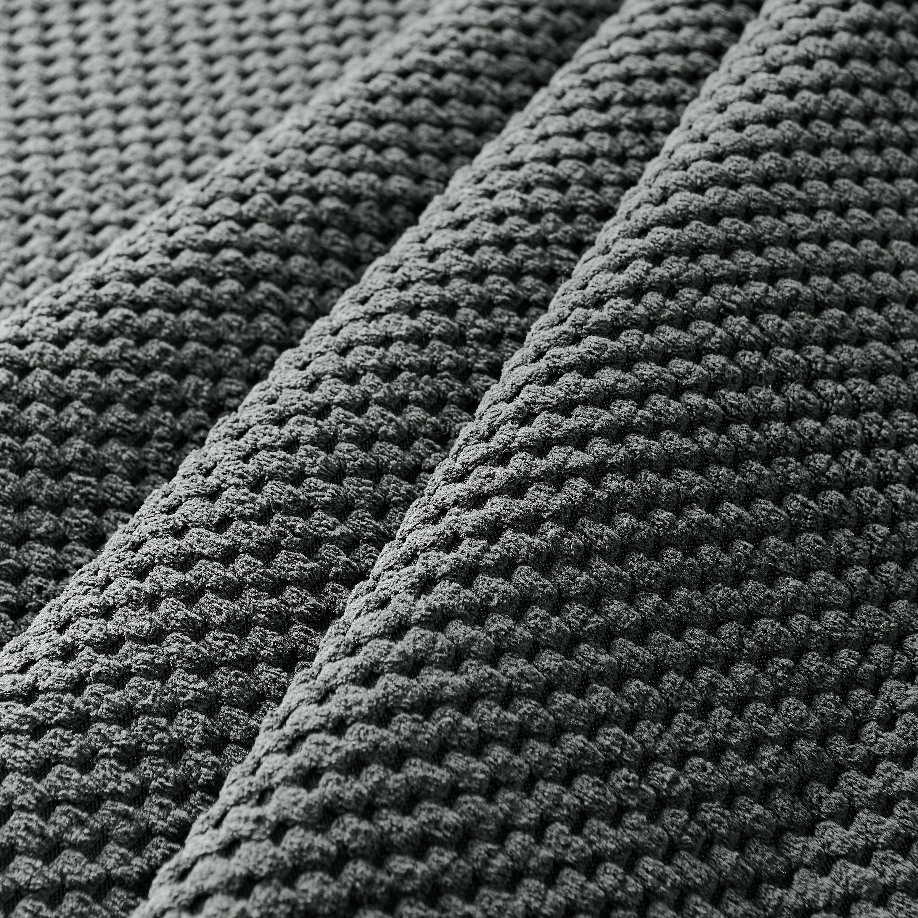 Manual reclining chair padded footrest mechanism detail
